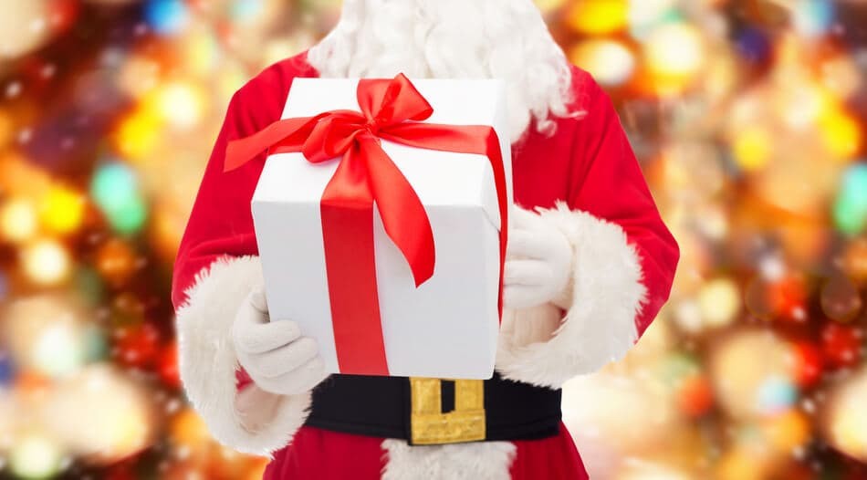 man in costume of santa claus with gift box